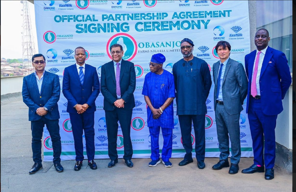 From Left to Right: Mr Arjun Bhowmik- Vice President Operations, AMEA, Danone; Mr. Kayode Adebiyi, Managing Director of Fan Milk PLC; Mr. Vikram Agarwal, Global Chief Operations Officer, Danone; Chief Olusegun Obasanjo, GCFR, Former President of the Federal Republic of Nigeria and Chairman of Obasanjo Farms Limited; Mr Olayinka Akinkugbe, Chairman Board of Directors, Fan Milk Nigeria; and Mr Herve Barrere General Manager, Danone Sub-Saharan Africa; Olakunle Olusanya, Director, Legal and Public Affairs, and General Secretary Fan Milk PLC, at the signing ceremony between Fan Milk- Danone and Obasanjo Farms.